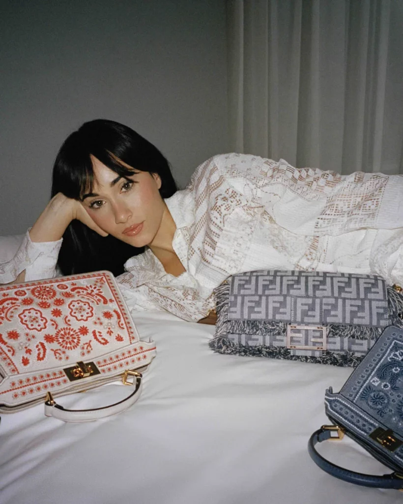 A Spanish starlet journeys through a dreamy summer day, carrying FENDI’s newest bag as her stylish companion